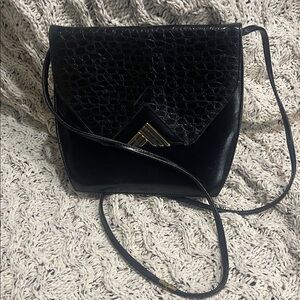 Chic Black Crossbody Bag with Gold Accent